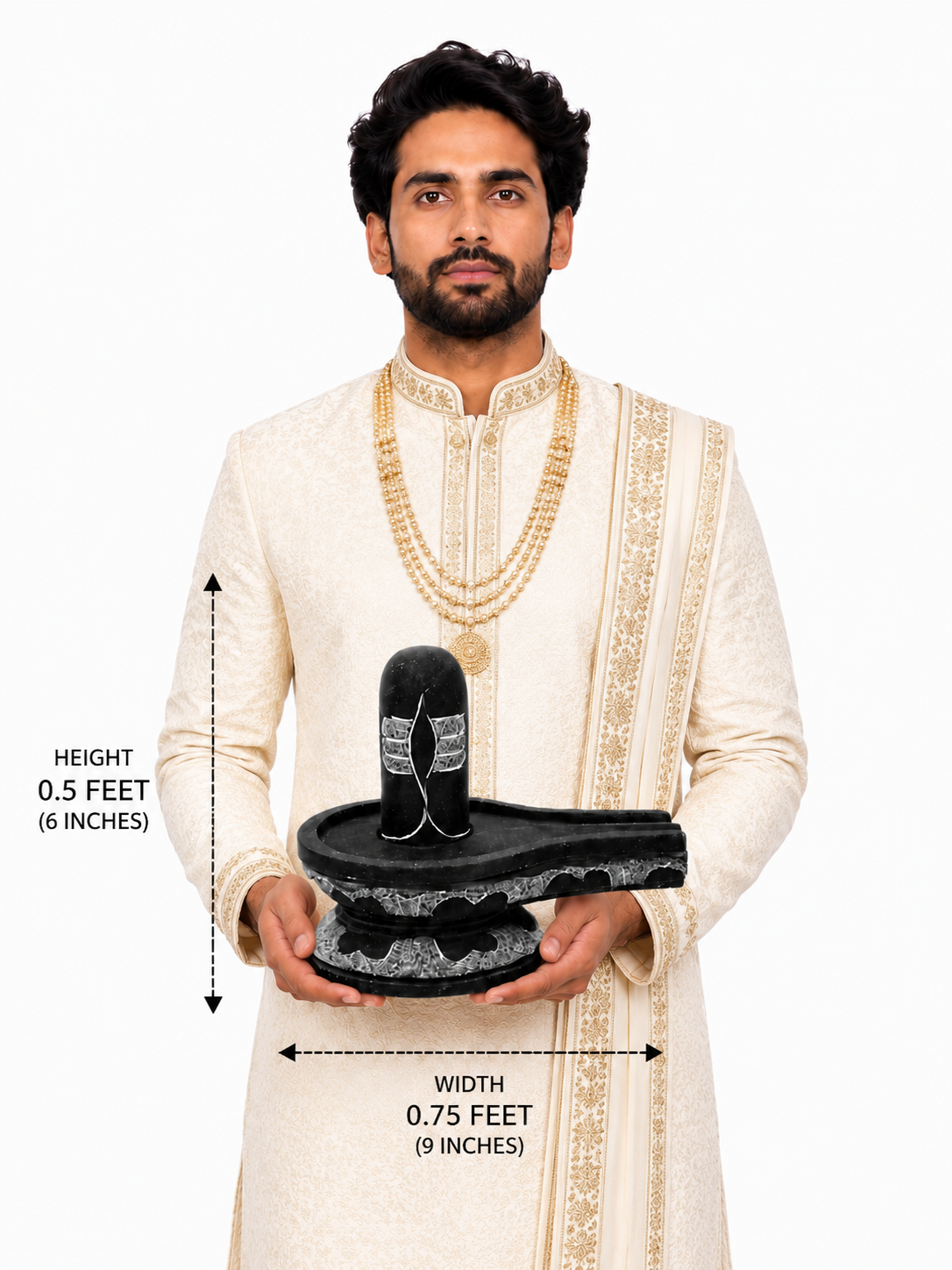 Hand-carved 0.5 ft Third Eye Shiva Lingam statue in polished black stone shown with an adult model for scale and measurements.