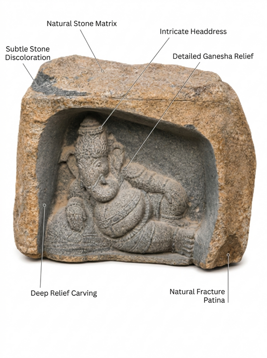 Hand-carved 1.9 ft Ganesha Boulder Statue in natural Charnockite stone, product view 2 showing the sculpture and carved details.