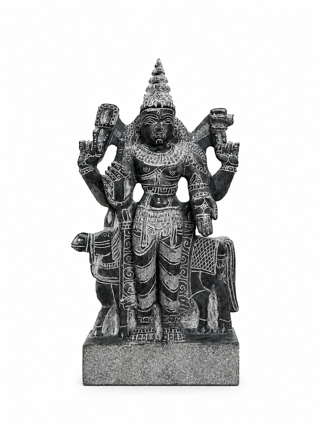 A dark gray stone statue of a multi-armed Hindu deity, likely Shiva, standing on a rectangular base against a plain white background.