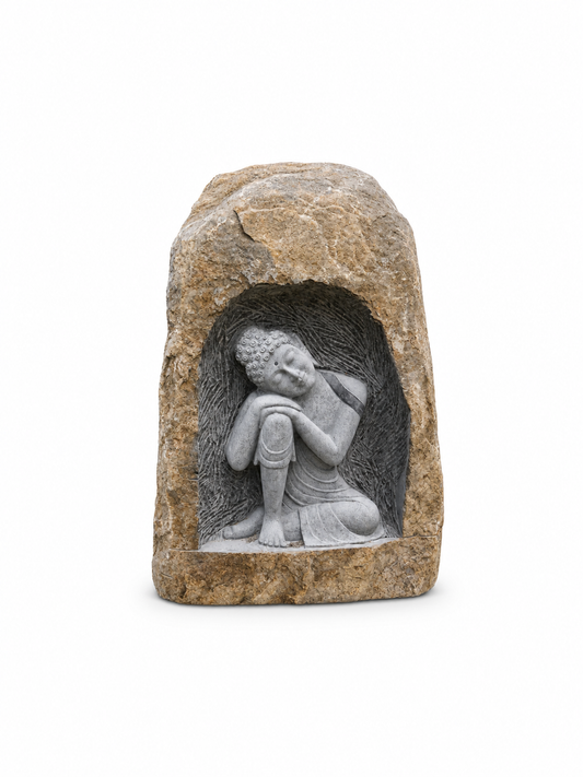 A small decorative garden statue carved from natural stone, featuring a seated Buddha figure set within a recessed niche, shown on a plain white background.