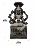 A black and beige stone statue of a seated Hindu deity with ornate jewelry and a large shell-like headdress, shown on a white background with dimension labels indicating height 4 feet and width 2.5 feet.