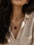 Elegant garnet necklace on Indian skin tone model lifestyle shot