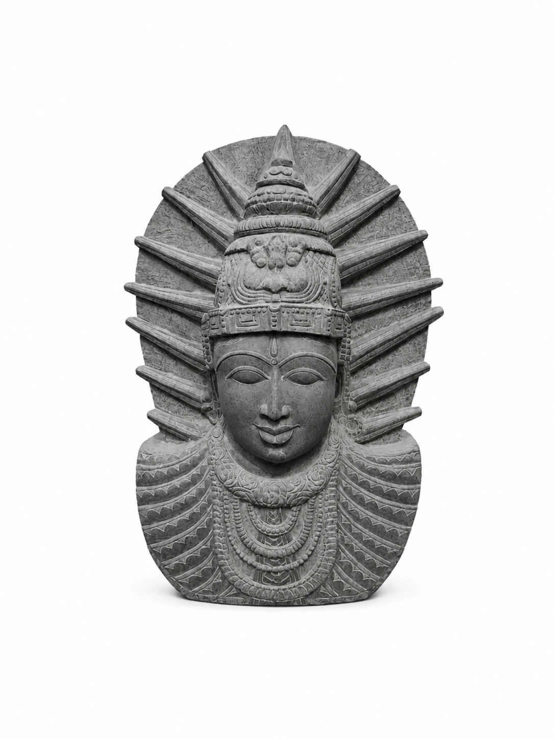A gray stone sculpture of a stylized face with a crown and radiating halo-like rays, centered on a plain white background.