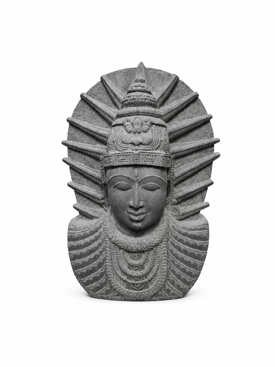 A gray stone sculpture of a stylized face with a crown and radiating halo-like rays, centered on a plain white background.