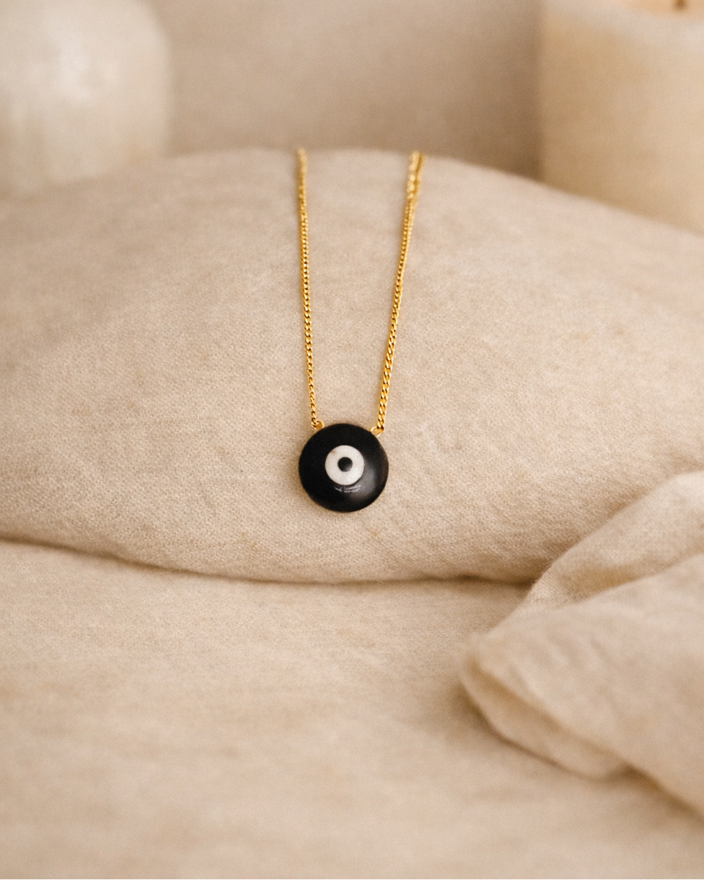 black onyx mens evil eye pendant on chain showing deep black stone