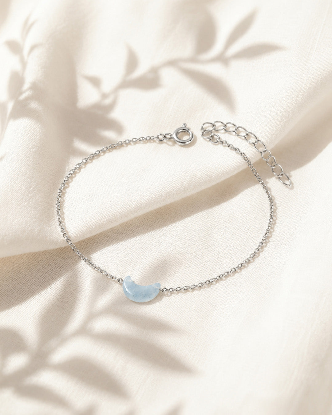 natural aquamarine crescent moon bracelet on display rex stones