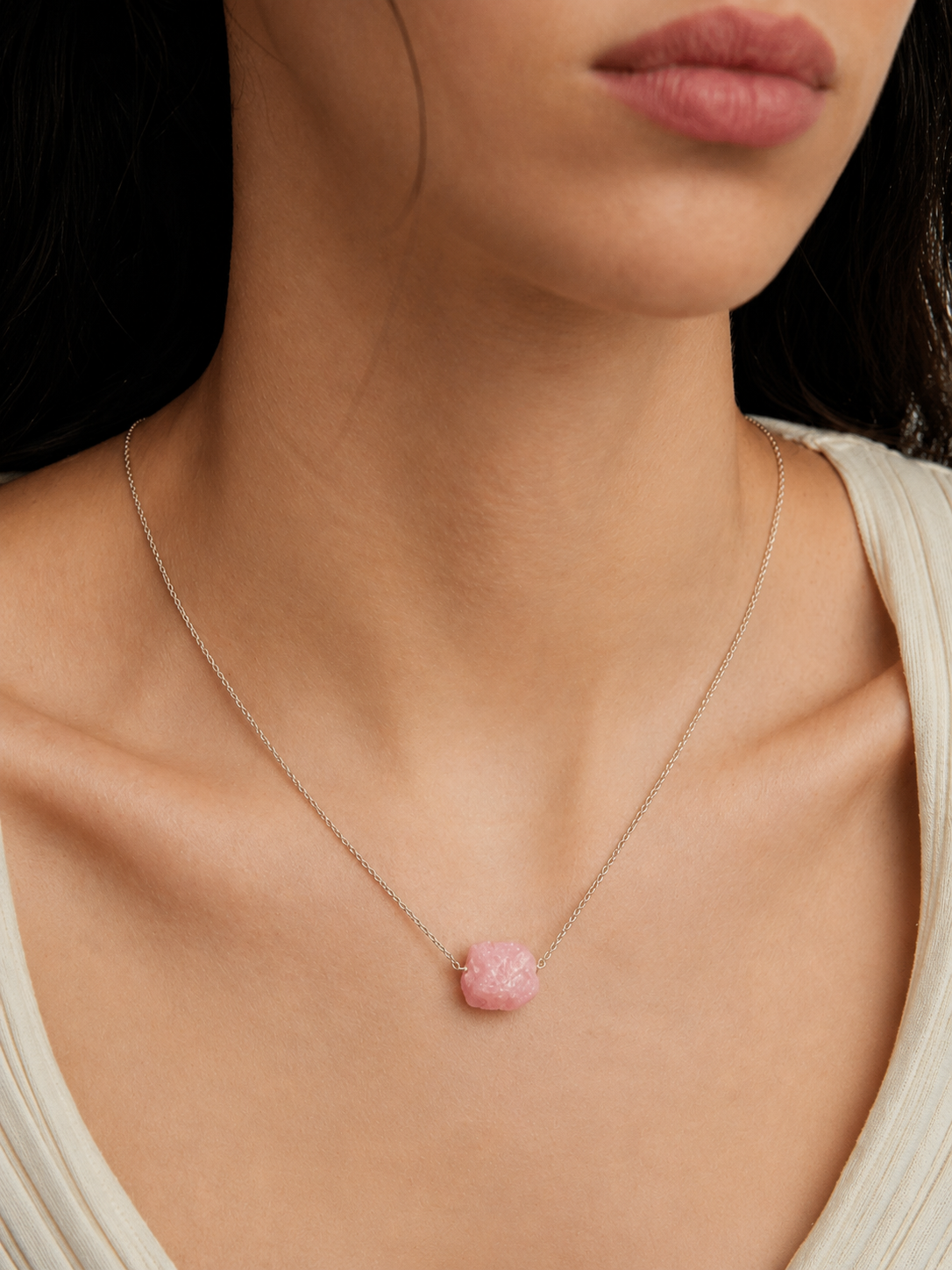 close up of natural rose quartz raw stone necklace rex stones
