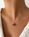 Model wearing natural Tiger Eye cloud pendant necklace, close-up front view