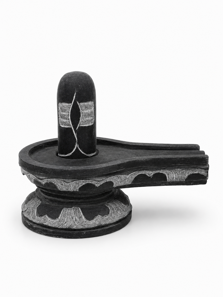 Hand-carved 0.5 ft Third Eye Shiva Lingam statue in natural stone, product view 1 highlighting the sacred carving and form.