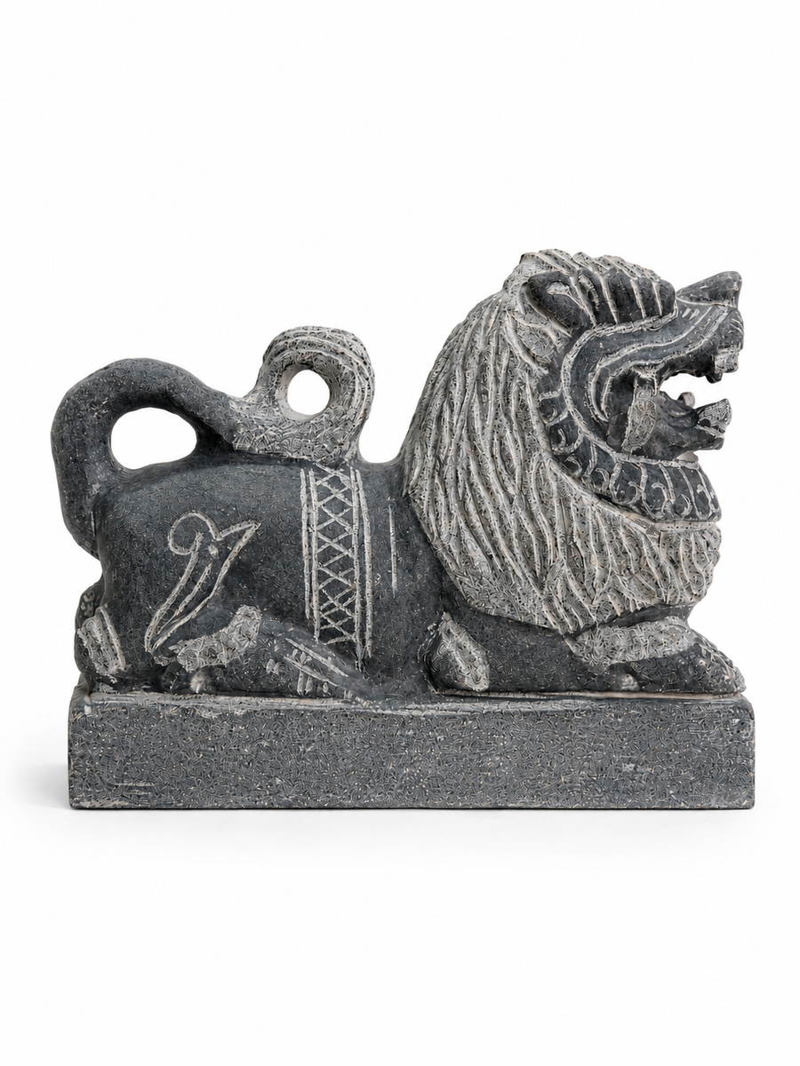 Hand-carved 0.8 ft Simha Vahanam lion statue in natural stone, product view 1 highlighting the animal form and carved details.