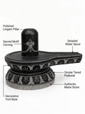 Hand-carved 0.8 ft Tripundra Shiva Lingam statue in natural stone, product view 2 highlighting the sacred markings and form.