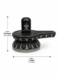 Hand-carved 0.8 ft Tripundra Shiva Lingam statue in natural stone, product view 4 highlighting the sacred markings and form.