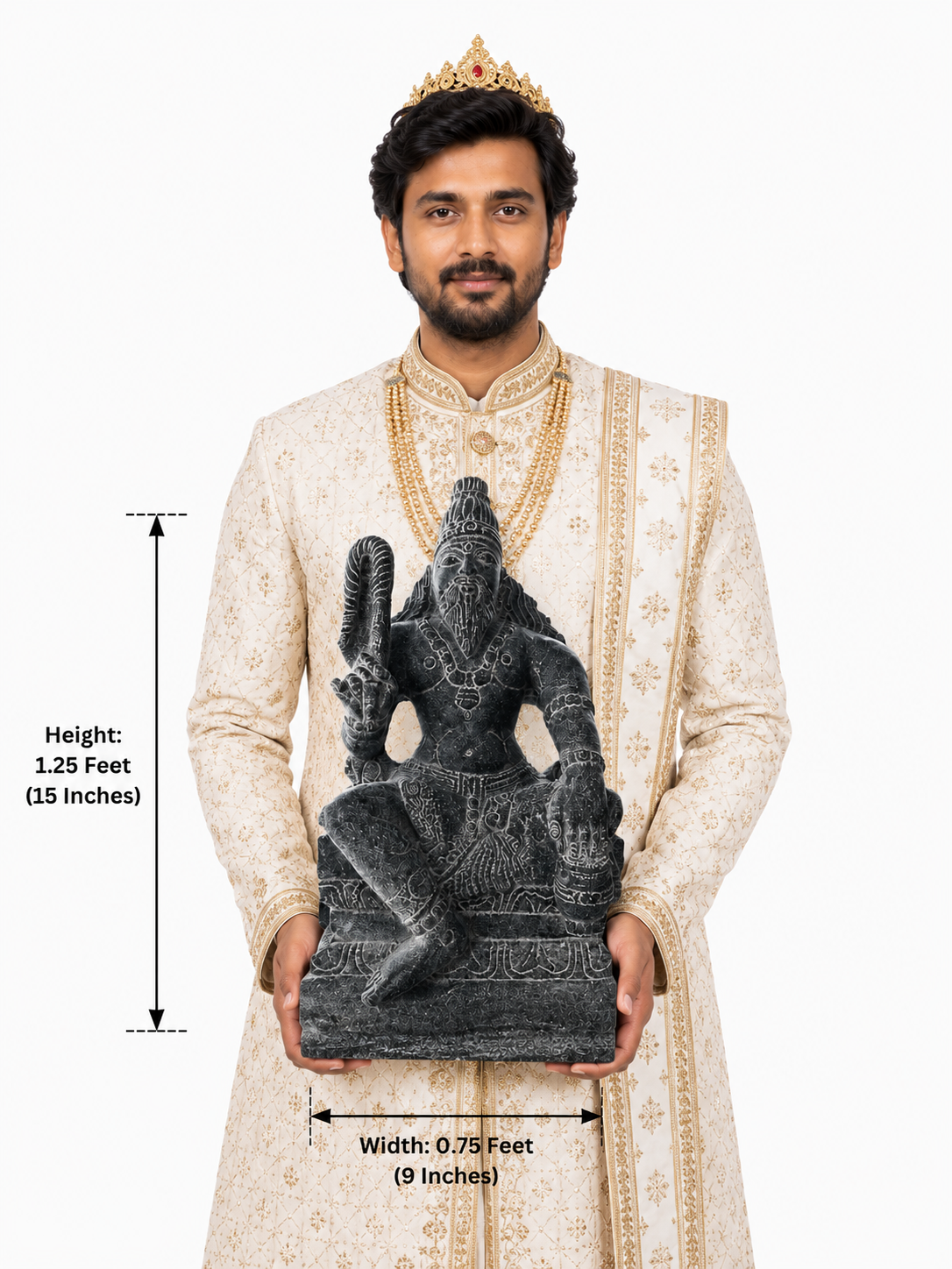Hand-carved 1.25 ft Agastya Maharishi statue in polished black stone shown beside an adult model for scale.