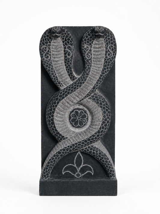 Hand-carved 1.25 ft Nagaraja and Nagini serpent pair in natural stone, product view 1 highlighting the paired figures and carved details.