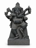 Hand-carved 1.25 ft Nritya Ganesha statue in natural stone, product view 1 highlighting the dancing pose and carved details.