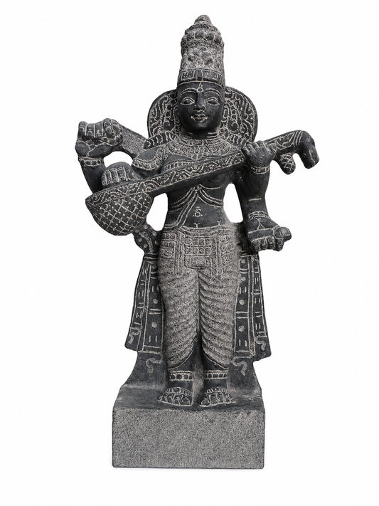 Hand-carved 1.25 ft Saraswati statue in natural stone, product view 1 highlighting the goddess form and carved details.