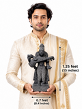 Hand-carved 1.25 ft Saraswati statue in natural stone, product view 6 highlighting the goddess form and carved details.