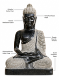 Hand-carved 1.5 ft Buddha statue in natural stone, product view 2 highlighting the meditative form and carved details.