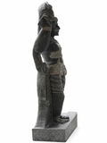 Hand-carved 1.5 ft Madurai Veeran statue in natural stone, product view 3 highlighting the guardian deity form and carved details.