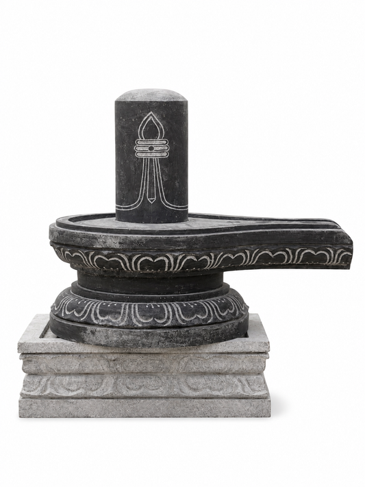 Hand-carved 1.5 ft Shiva Lingam statue in natural stone, product view 1 highlighting the sacred form and carved details.