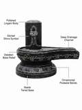 Hand-carved 1.5 ft Shiva Lingam statue in natural stone, product view 2 highlighting the sacred form and carved details.