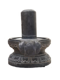 Hand-carved 1.5 ft Shiva Lingam statue in natural stone, product view 3 highlighting the sacred form and carved details.