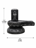 Hand-carved 1.5 ft Shiva Lingam statue in natural stone, product view 4 highlighting the sacred form and carved details.
