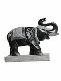 Hand-carved 1.5 ft temple guardian elephant statue in natural stone, product view 1 highlighting the animal form and carved details.