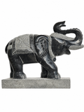 Hand-carved 1.5 ft temple guardian elephant statue in natural stone, product view 4 highlighting the animal form and carved details.