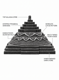 Hand-carved 1 ft Chakram sculpture in natural stone, product view 2 highlighting its circular form and carved details.