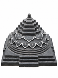 Hand-carved 1 ft Chakram sculpture in natural stone, product view 4 highlighting its circular form and carved details.