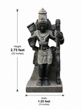 Hand-carved 2.75 ft Lakshmanan statue in polished black stone shown beside an adult model for scale with measurements.