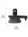 Hand-carved 2.9 ft Shiva Lingam with Ornate Carved Pedestal in natural Charnockite stone, product view 6 showing the sculpture and carved details.