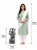 Hand-carved 2 ft Dakshinamurthy statue in natural stone, product view 6 highlighting the seated teaching form and carved details.