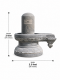 Hand-carved 2 ft Shiva Lingam with Carved Lotus Pedestal in natural Charnockite stone, product view 3 showing the sculpture and carved details.