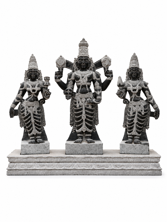 Hand-carved 3.5 ft Vishnu with Lakshmi and Bhoo Devi statue set in natural stone, product view 1 showing the three figures.