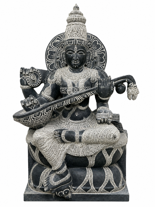 Hand-carved 3 ft Saraswati statue in natural stone, product view 1 highlighting the sculpture and carved details.