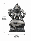 Hand-carved 3 ft Sivakami Amman statue in polished black stone shown beside an adult model for scale with measurements.
