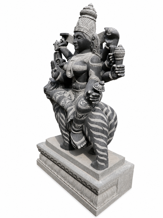 Hand-carved 4.6 ft Durga Devi Riding Tiger Statue in natural Charnockite stone, product view 1 showing the sculpture and carved details.