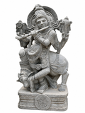 Hand-carved 4 ft Lord Krishna statue with cow in natural stone, product view 1 highlighting the Venugopala form and carved details.