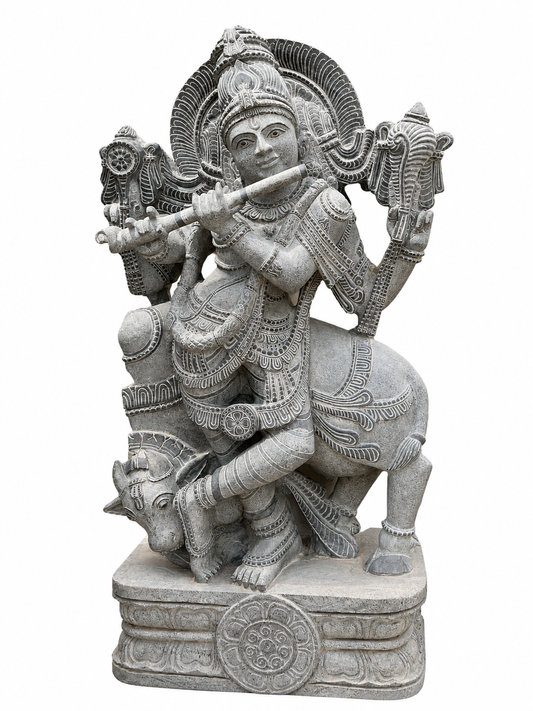 Hand-carved 4 ft Lord Krishna statue with cow in natural stone, product view 1 highlighting the Venugopala form and carved details.