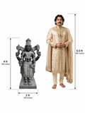Hand-carved 4 ft Vishnu Perumal statue in polished Charnockite black stone shown beside an adult model for scale with measurements.