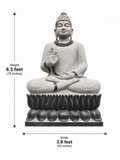 Hand-carved 6.3 ft Monumental Buddha on Lotus Throne Statue in natural Charnockite stone, product view 6 showing the sculpture and carved details.