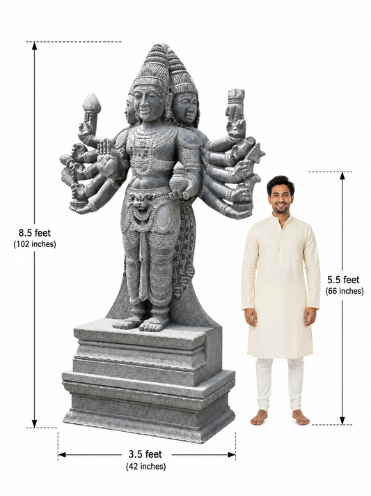 Hand-carved 8.5 ft Arumuga Swamy statue in polished black stone shown beside an adult model for scale with measurements.