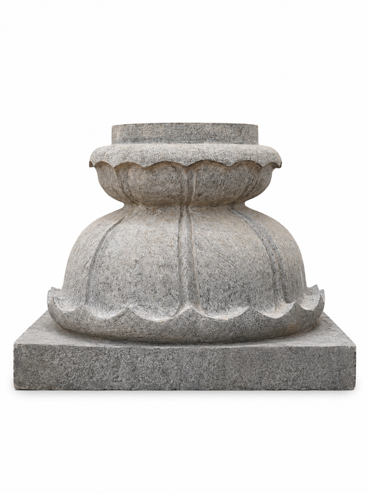 Front product view of a hand-carved Lotus Balipeedam pedestal in polished stone on a white background.