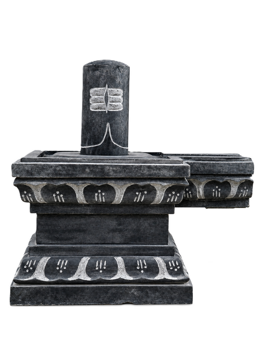 Hand-carved Shiva Lingam statue in natural stone, product view 1 highlighting the sacred form and carved details.