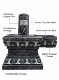 Hand-carved Shiva Lingam statue in natural stone, product view 2 highlighting the sacred form and carved details.