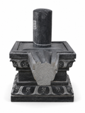 Hand-carved Shiva Lingam statue in natural stone, product view 3 highlighting the sacred form and carved details.