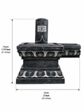 Dimension guide for a hand-carved Shiva Lingam in polished black stone showing height and width on a white background.