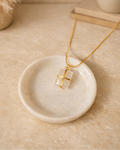 white moonstone mens pendant showing soft glowing natural stone